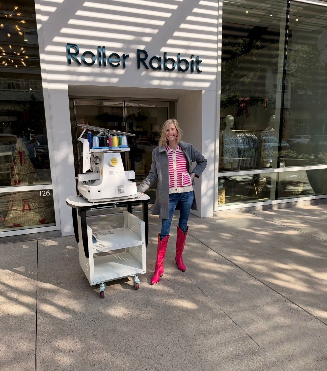 Emily outside the Roller Rabbit store with her machine